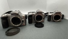 Lotto reflex digitali Canon EOS Rebel (300D 350D 400D) non testate AS-IS per ricambi/riparazione