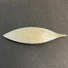 Antico strumento da cucire