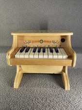 Pianoforte a batteria in legno