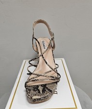 scarpe maculate con tacco alto