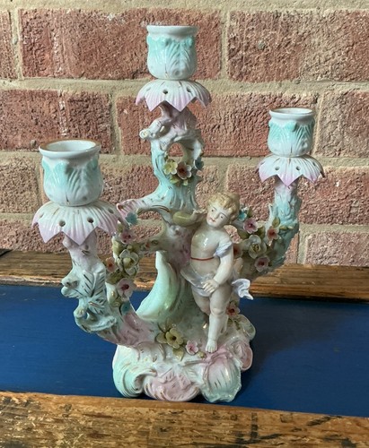 Antico candelabro portacandele