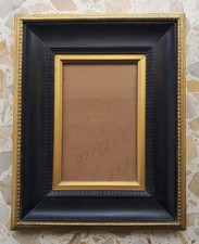 Cornice antica in legno con