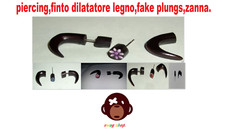 piercing,finto dilatatore legno,fake plungs,zanna,ANALLERGICO,punk,etnico,rasta.