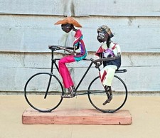 Coppia con bambino bicicletta