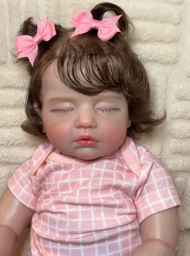 Bambola bambina realistica