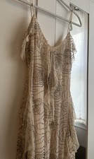 Abito midi in rete con perline