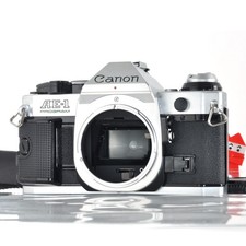 Canon AE-1 Program 35 mm fotocamera reflex pellicola corpo argento dal Giappo...