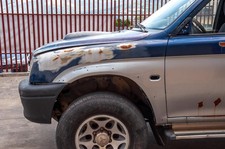 PARAFANGO ANTERIORE SINISTRO PER MITSUBISHI L 200 2° Serie MR954765 (86>96)