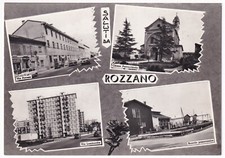 P01253 - CARTOLINA ROZZANO - VEDUTE PANORAMICHE CON BAR TABACCHI E FIAT - g/vg