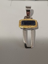Croce in oro bianco giallo e onice 18Kt.