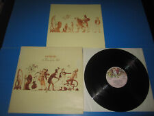 GENESIS -A TRICK OF THE TAIL- CHARISMA 6369 974 A NM/NM TEXTURED,GF. INSERTO 1ST