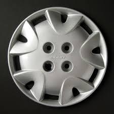 SET DI 4 COPRICERCHI 13" X