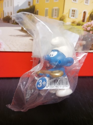 Puffo con chiave oro - puffo, d'oro