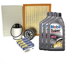 KIT TAGLIANDO + 4 CANDELE +3LT