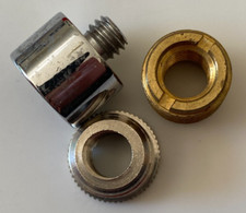 3 adattatori filettati per supporti microfonici.