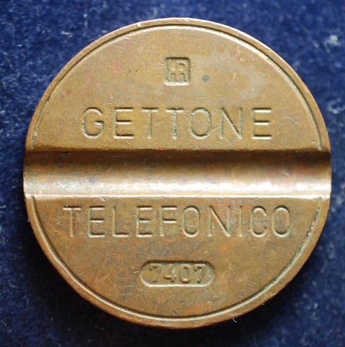 Gettone telefonico ipm - gettone,