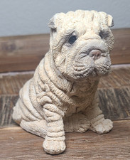 Adorabile statuina cucciolo