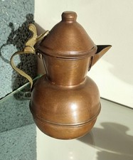 Antica brocca in rame da