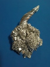 GRANDE CORNUCOPIA RIVESTITA IN ARGENTO.