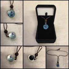 COLLANA CON CIONDOLO ASTRALE DI FORMA SFERICA