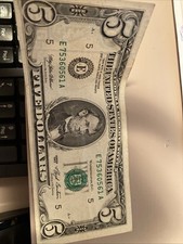 2banconote da 5 dollari