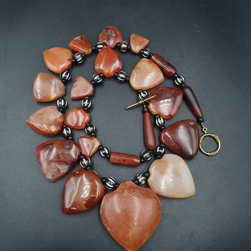 Collana con ciondolo amuleto