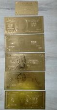 Set banconote dollari americani in oro. Nuovo.