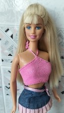 Barbie Bellissima come da foto con top gonna mini e scarpe.