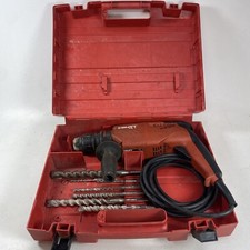 Trapano a percussione rotativo