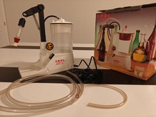 Riempitore automatico per