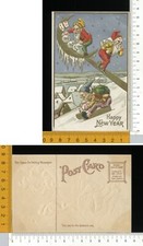 V3586] BUON ANNO NUOVO - SCENA GNOMI ELFI SU SLITTA E LUNA CON MONETE - RILIEVO