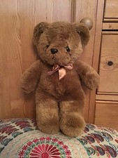 Peluche morbido fiocco oro