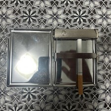 ACCENDINO in metallo  Con Portasigarette.