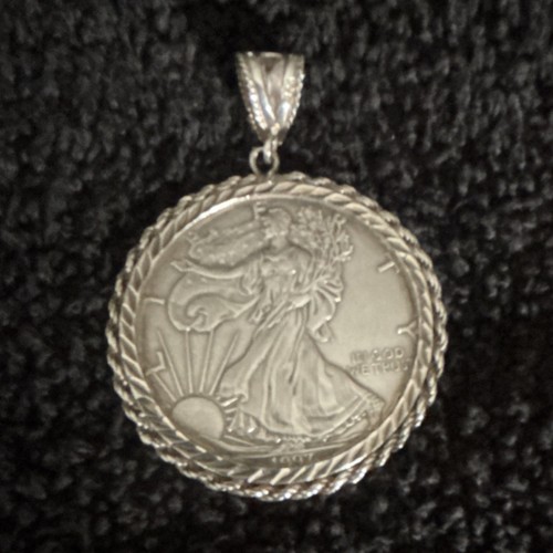 Ciondolo moneta argento un - da,