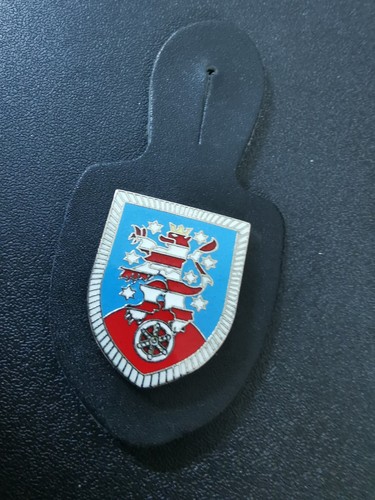 Ciondolo pettorale distintivo