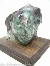 Scultura con testa di Indios