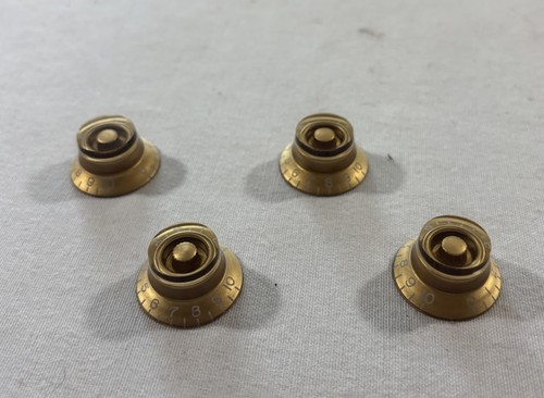 Pomelli cappello top oro