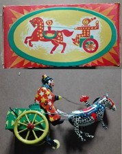 Clown con carretto e cavallo