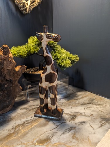 Statua legno intagliato a - in,