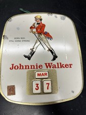 Calendario perpetuo Johnnie Walker in metallo anni 50