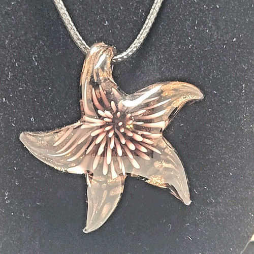 Collana con ciondolo - , macchie
