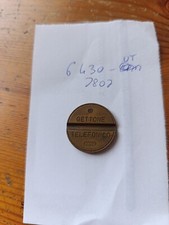 Gettone telefonico 7807 UT