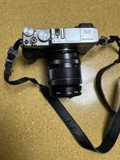 fujifilm x-e2 + Fujinon Fx18-55 + Mirror Lens+ Bags + Hand Grip