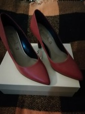 decoltè donna rosse in pelle