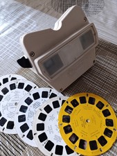 proiettore manuale anni 60 beige funzionante con 5 dischetti 