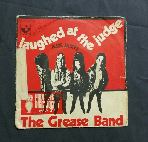 The grease band laughed - ,