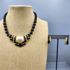 Collana e orecchini clip perle