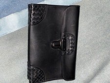bottega veneta pochette in pelle intrecciata nera uomo