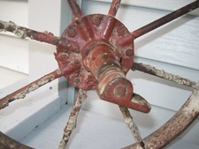 ANTIQUE IRON 8 SPOKE WHEEL RED