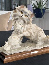 Statuina Giuseppe Armani